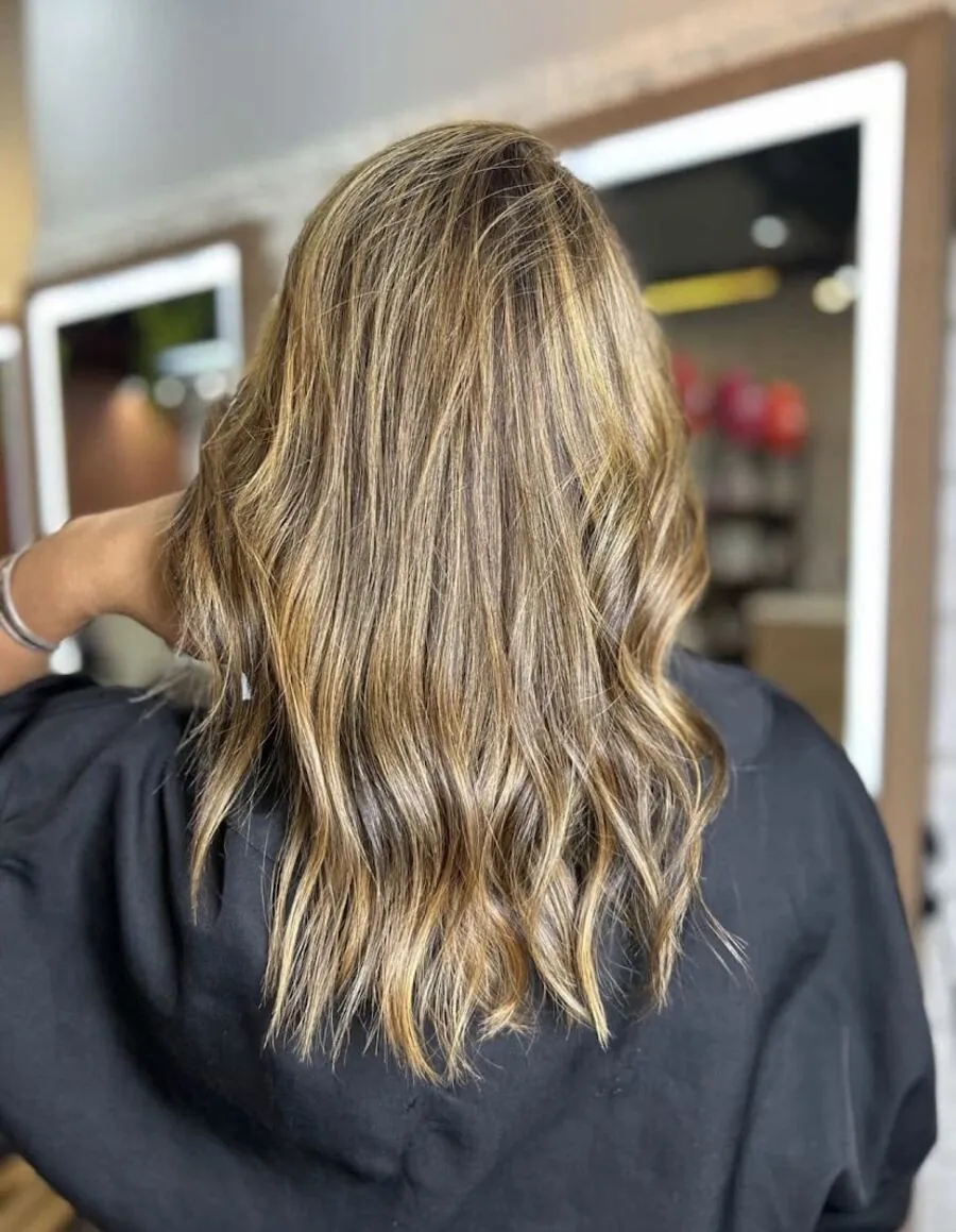 Iluminado em cabelo ondulado
